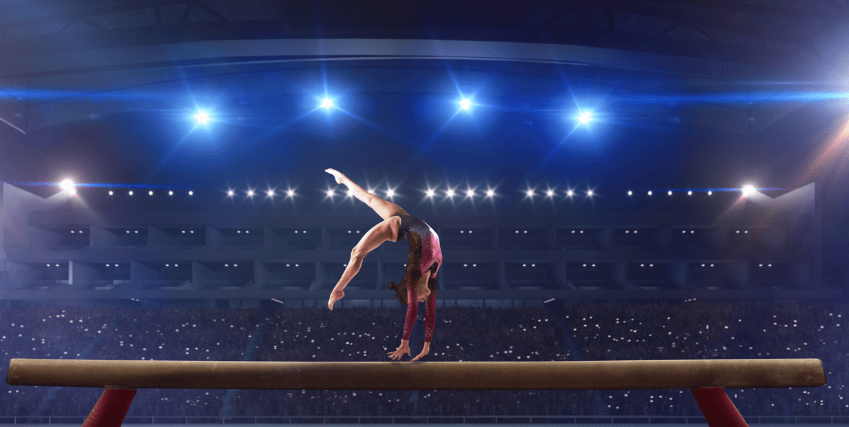 Gymanst on the beam. Credit Adobe Stock.