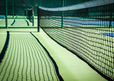 Wimbledon celebrates return, but at what cost? 